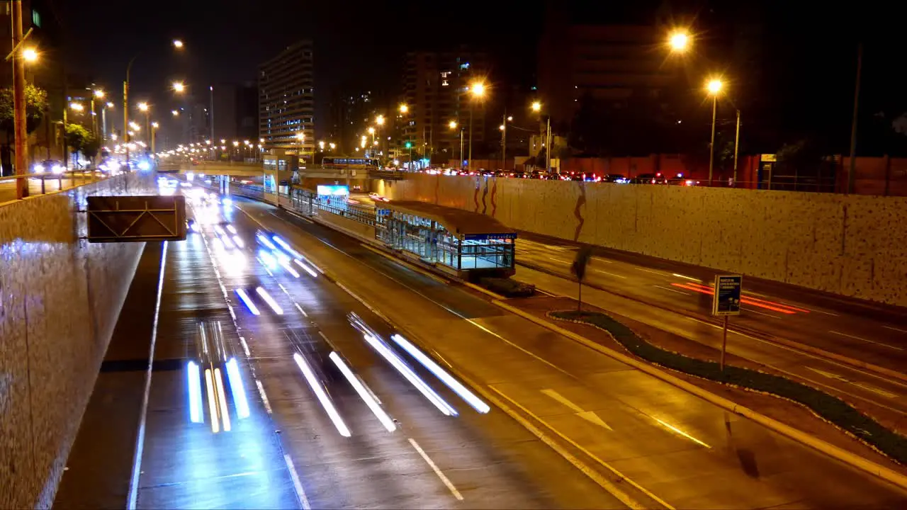 Timelapse of freeway called "Via Expresa" Cars drive by with motion blur