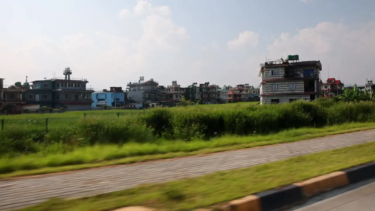 Buildings on the outskirts of Kathmandu vehicle view