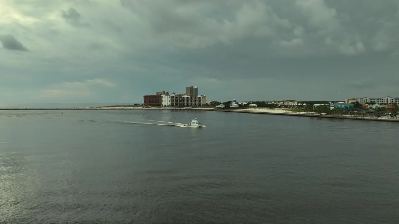 Aerial view of fishing boat returning at Perdido Pass in Orange Beach Alabama