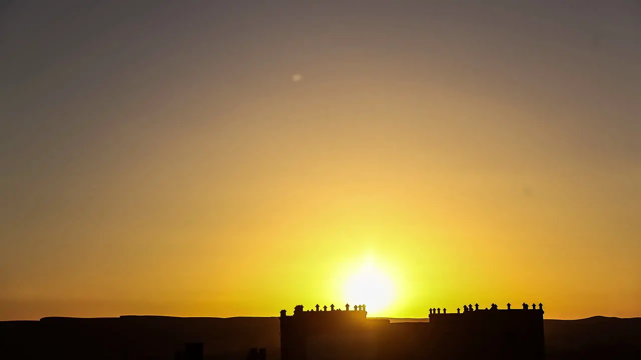 Cinematic timelapse of golden sunset behind the fort