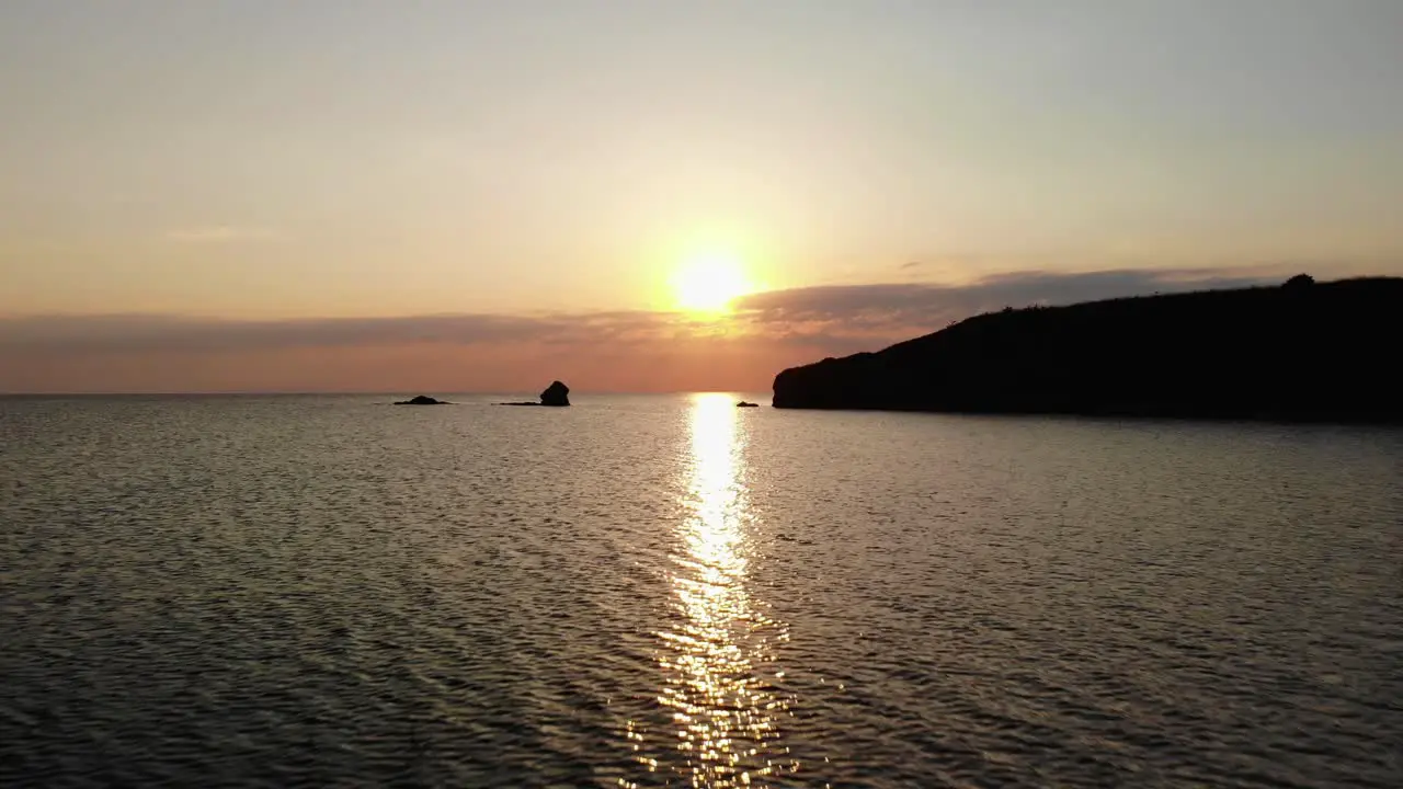 Aerial panning footage of sunrise over sea and seashore  Bulgaria-1