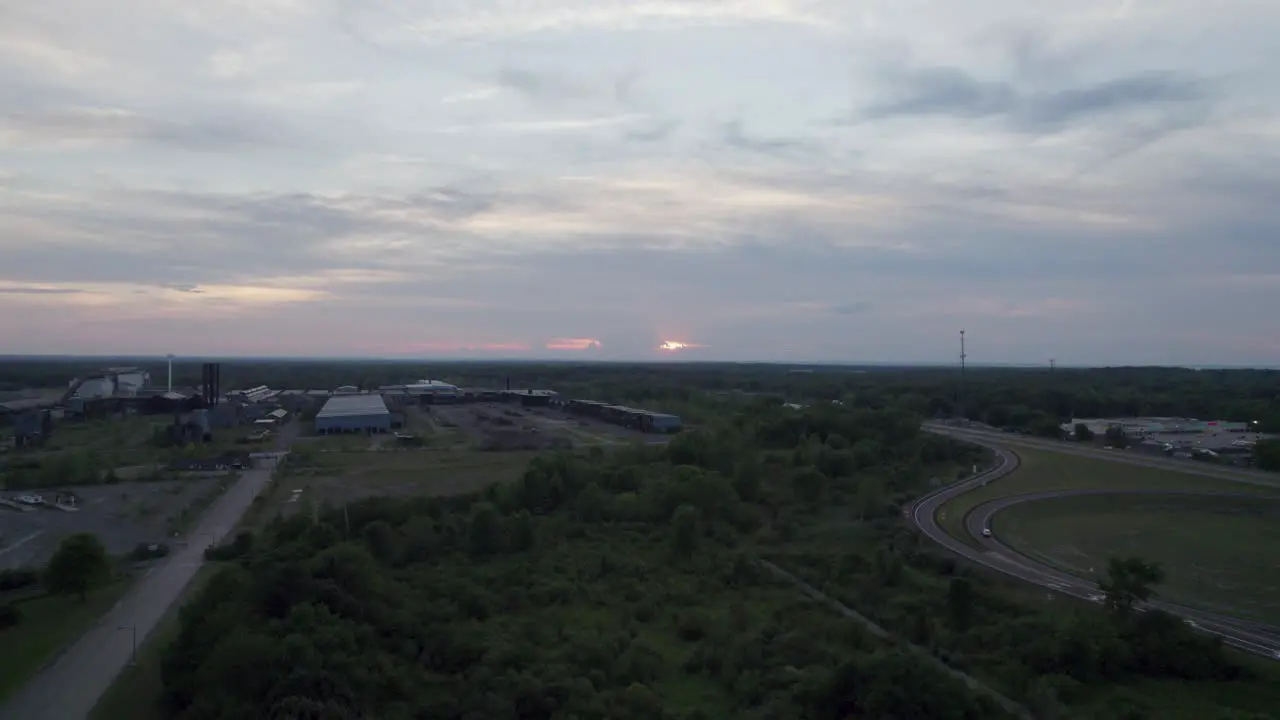 A drone shot of a vast land at sunset time