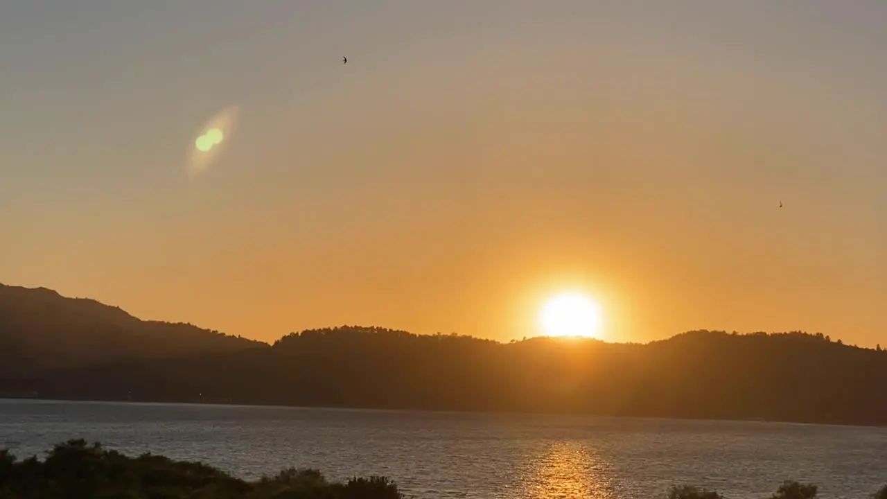 Summer sunset at the Atlantic sea coast seascape and mountain view