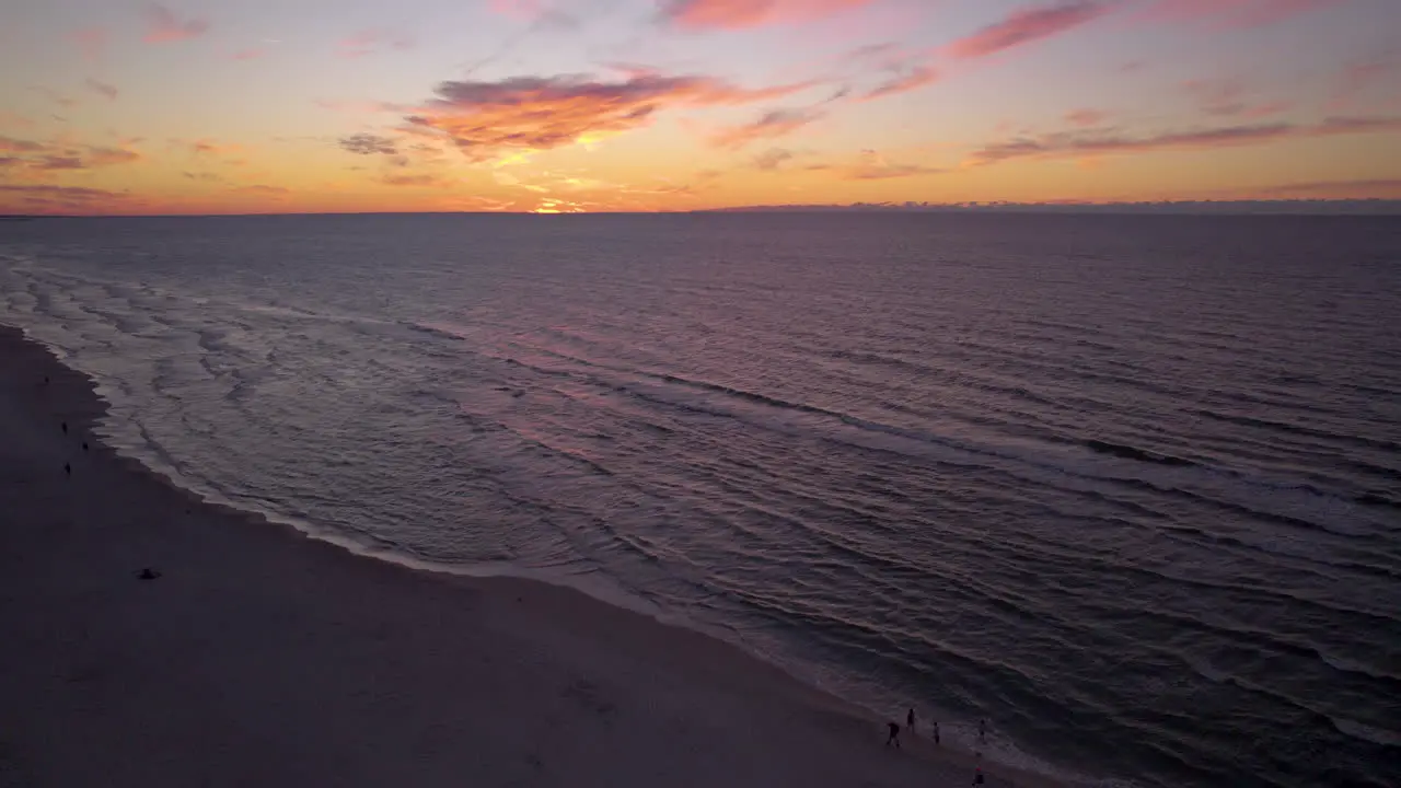 Aerial Drone View Of People On A Sunset Beach Of Krynica Morska Poland