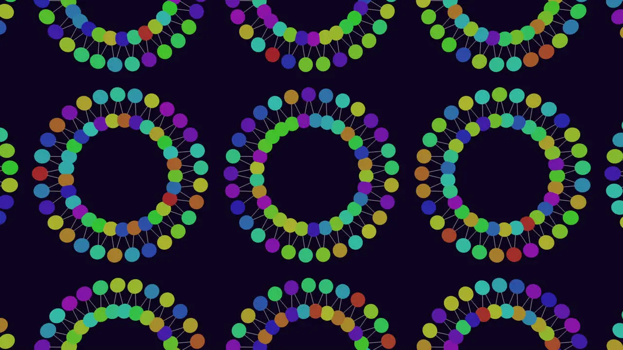 Colorful circles in a symmetrical pattern on black background