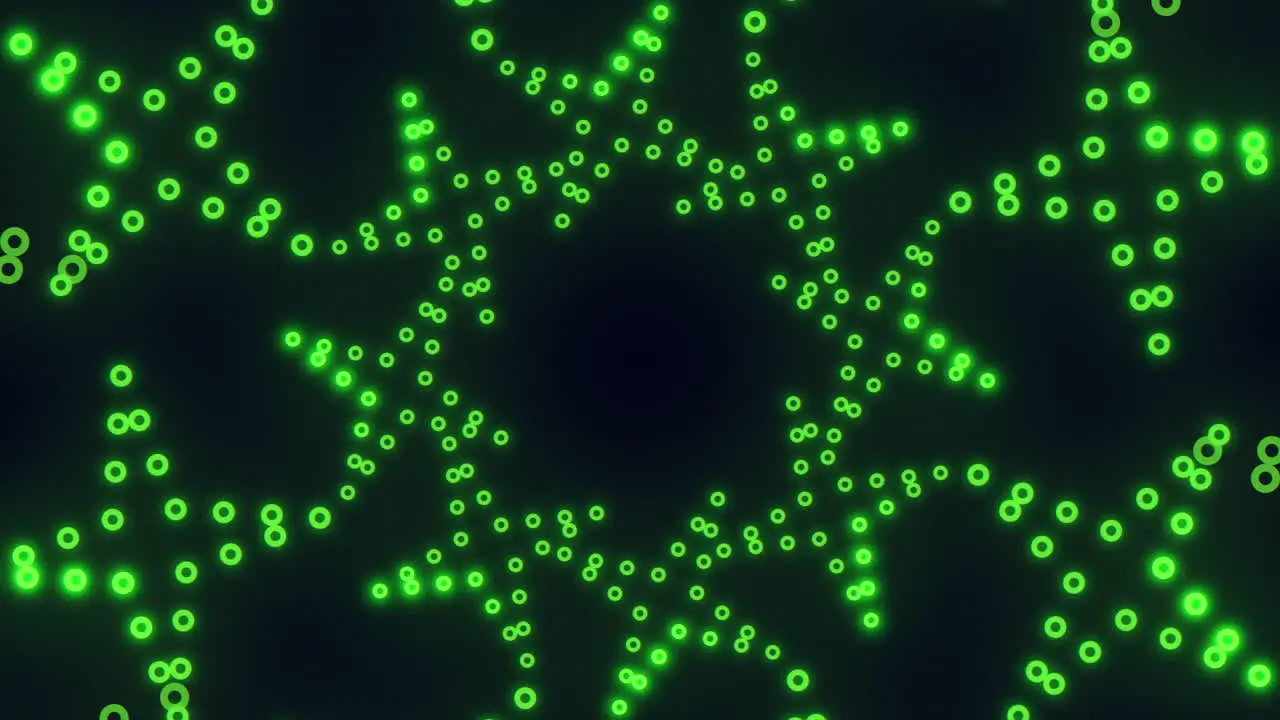 Intricate green dot pattern on black background