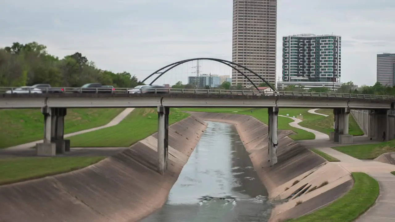 This video is about a time lapse of cars going over the Buffalo Bayou on bridge in Houston Texas