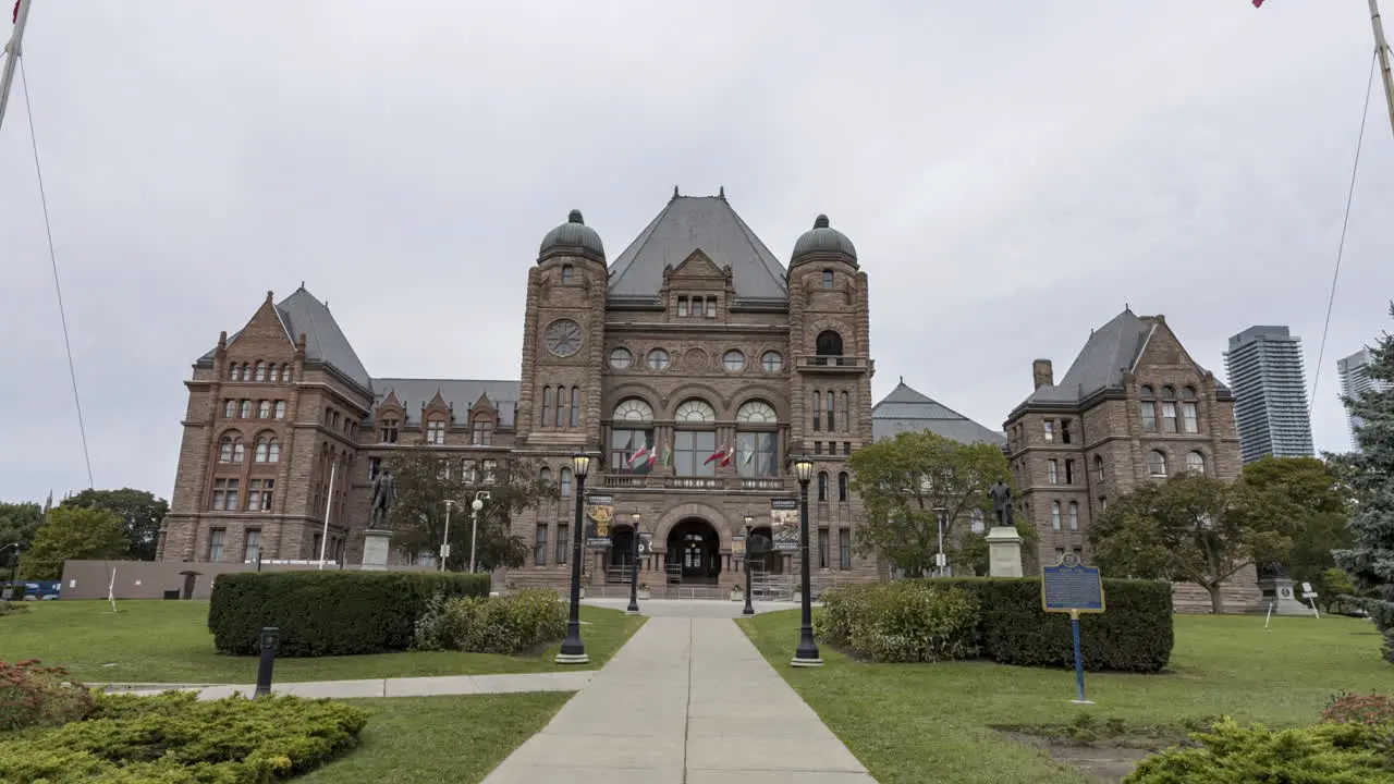 Hyperlapse of Ontario Legislative Building in Toronto with looming stormy overcast sky behind