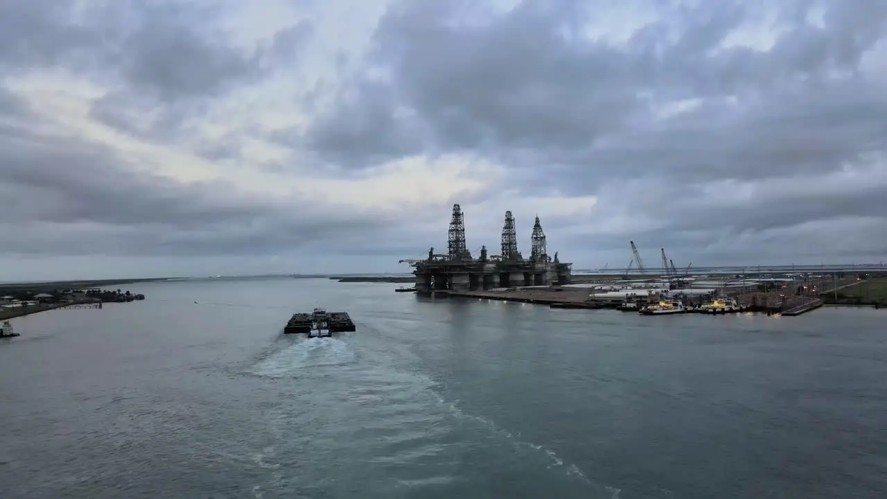 Barge by Oil Rigs on the Gulf of Mexico drone footage