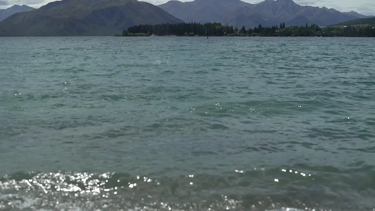 tilting up the clean waters of lake wakatipu in queenstown