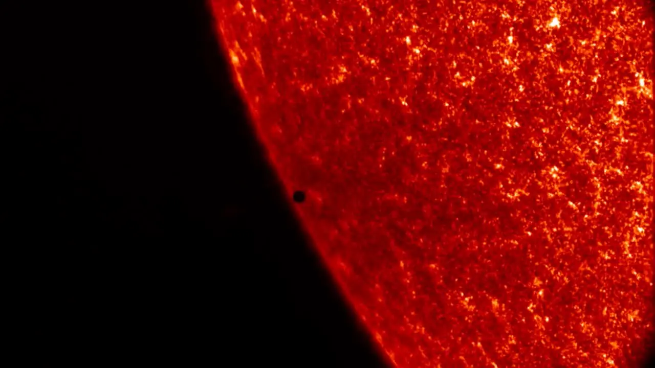 The Planet Mercury Passes In Silhouette Against The Sun