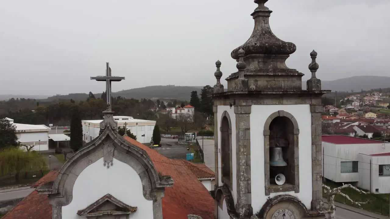 Small catholic church in the village in the interior of Portugal Europe drone view from the top of the tower