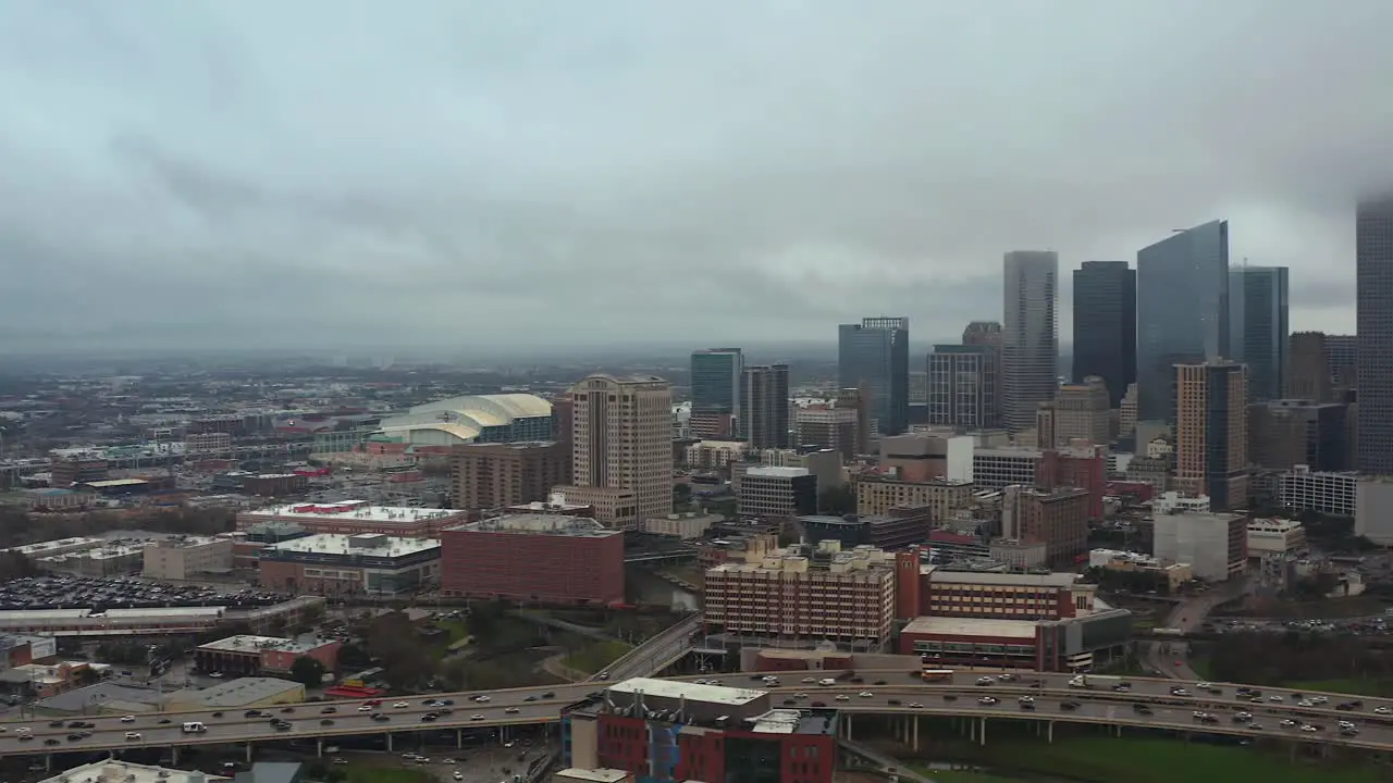 This video is about an aerial view of downtown Houston on a gloomy and rainy day