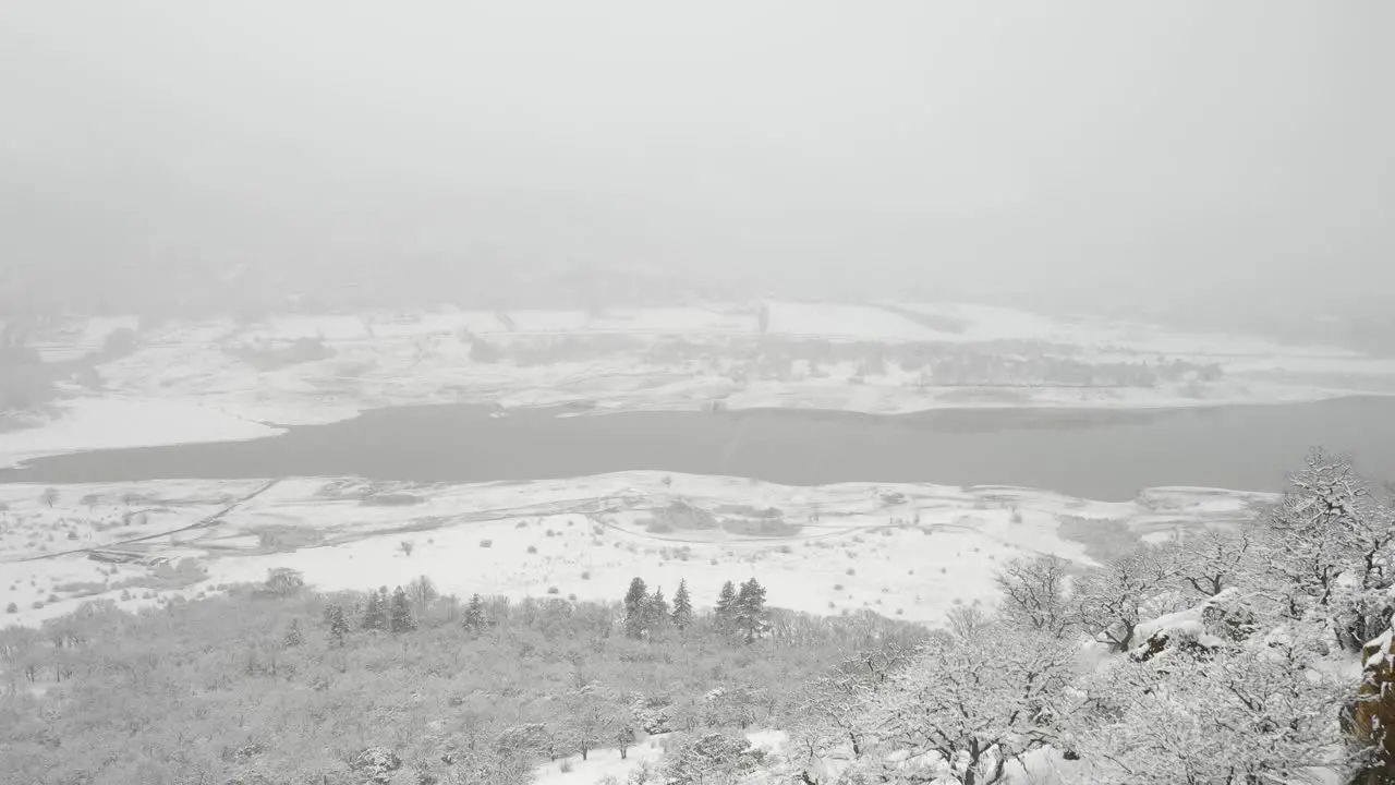 Drone shot of snow covered Emigrant Lake near Ashland Oregon