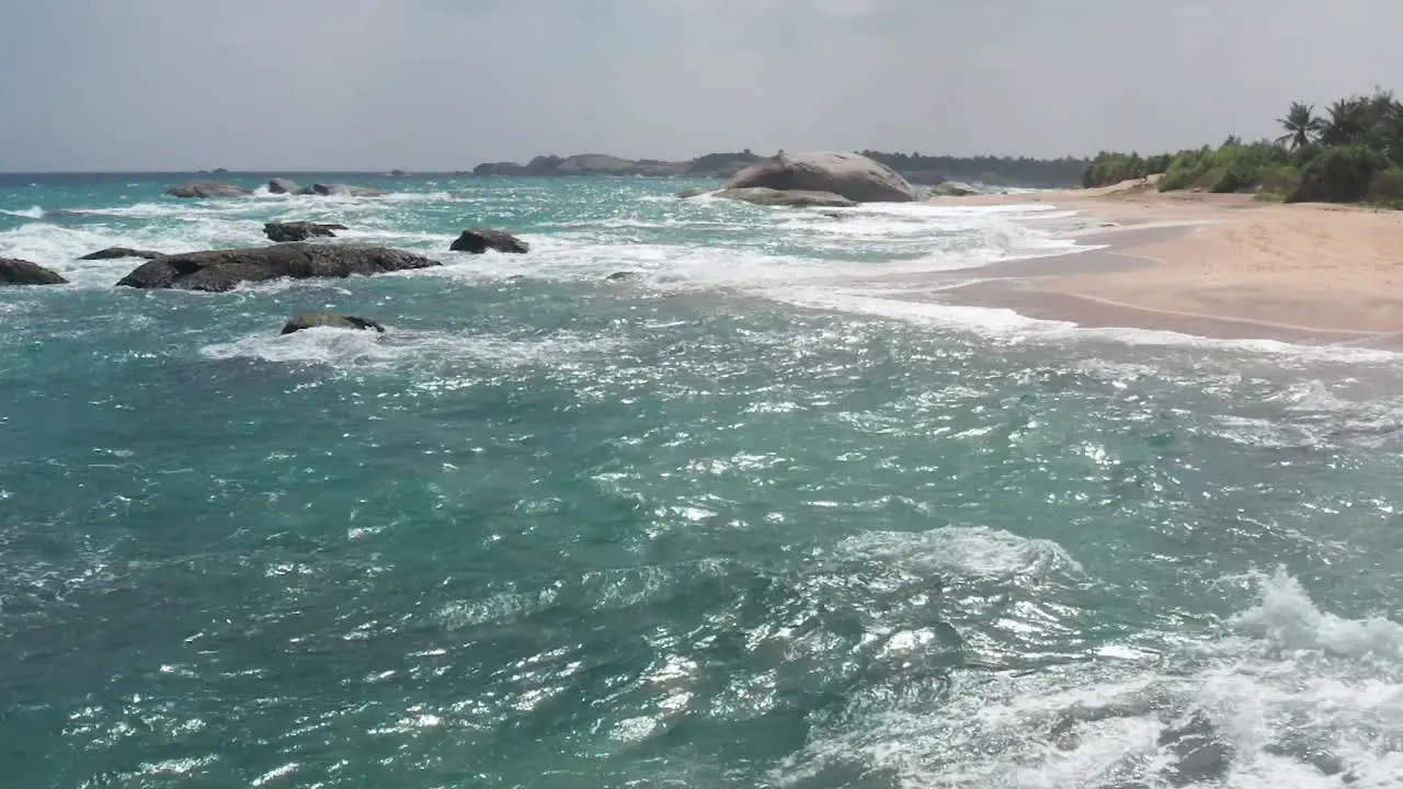 Aerial cinematic view over Beautiful tropical beach with Turquoise water