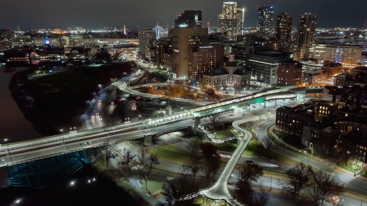 Aerial hyperlapse around the illuminated Charles MGH station night in downtown Boston USA