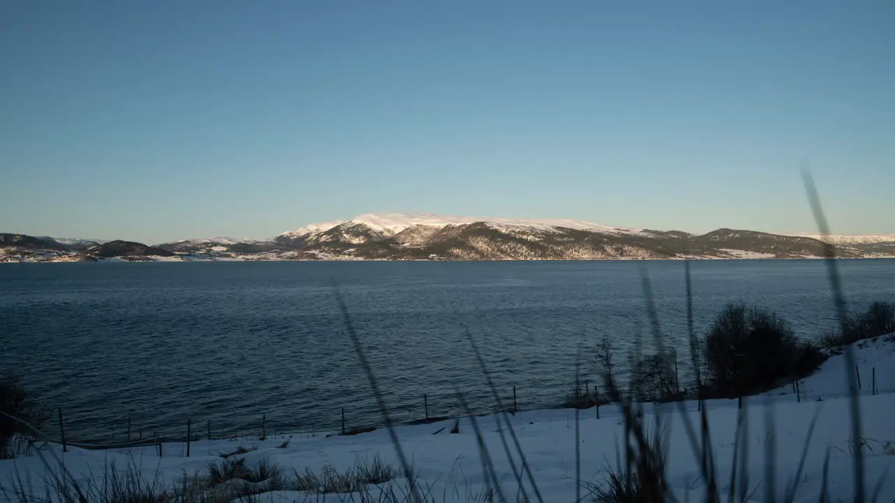 Full-Day Timelapse In The Fjord With Mountain Views At Winter Dawn to Night