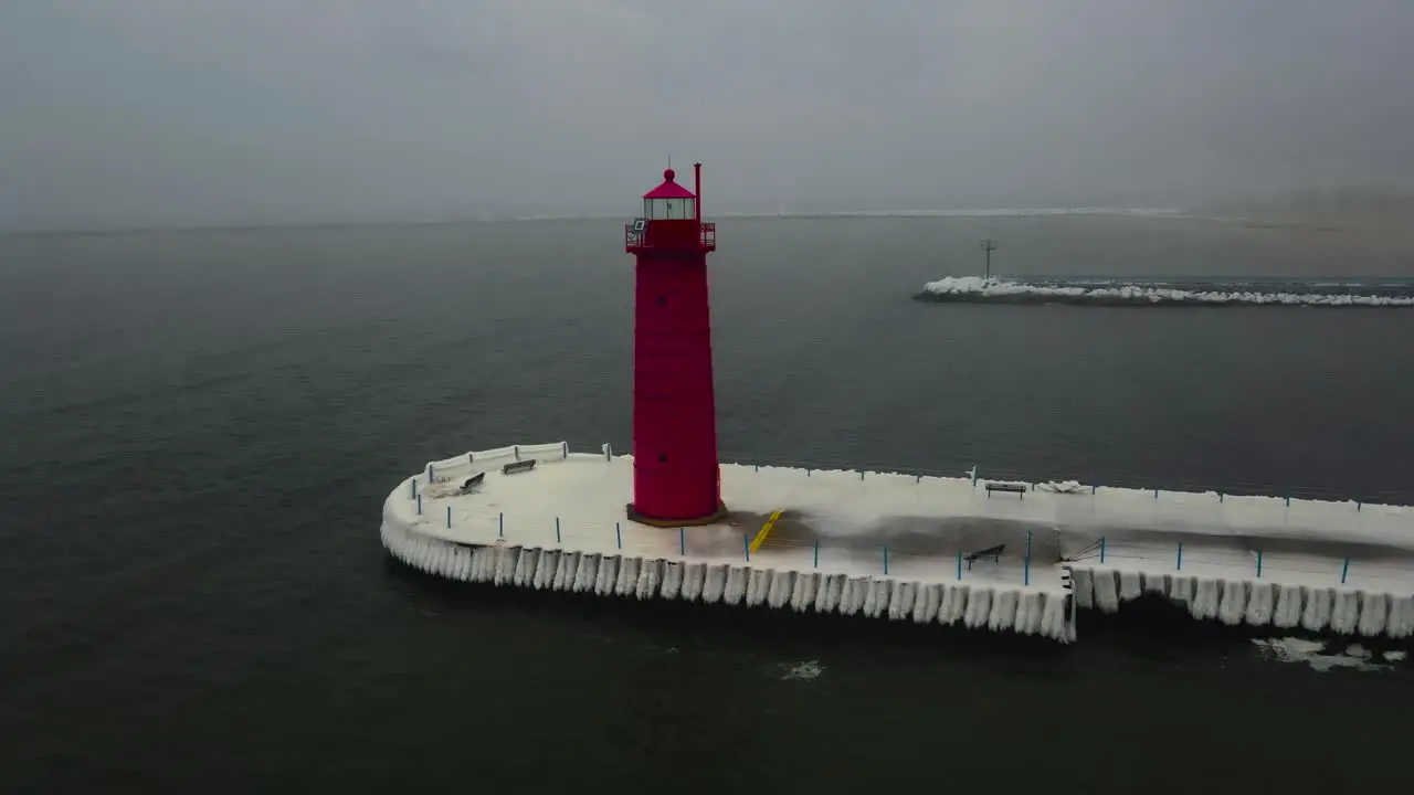 Panning around the Muskegon Lighthouse during a misty storm