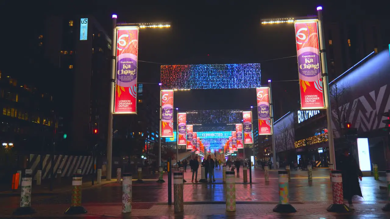 Multicoloured Winterfest modern illuminating artwork at Wembley park at night