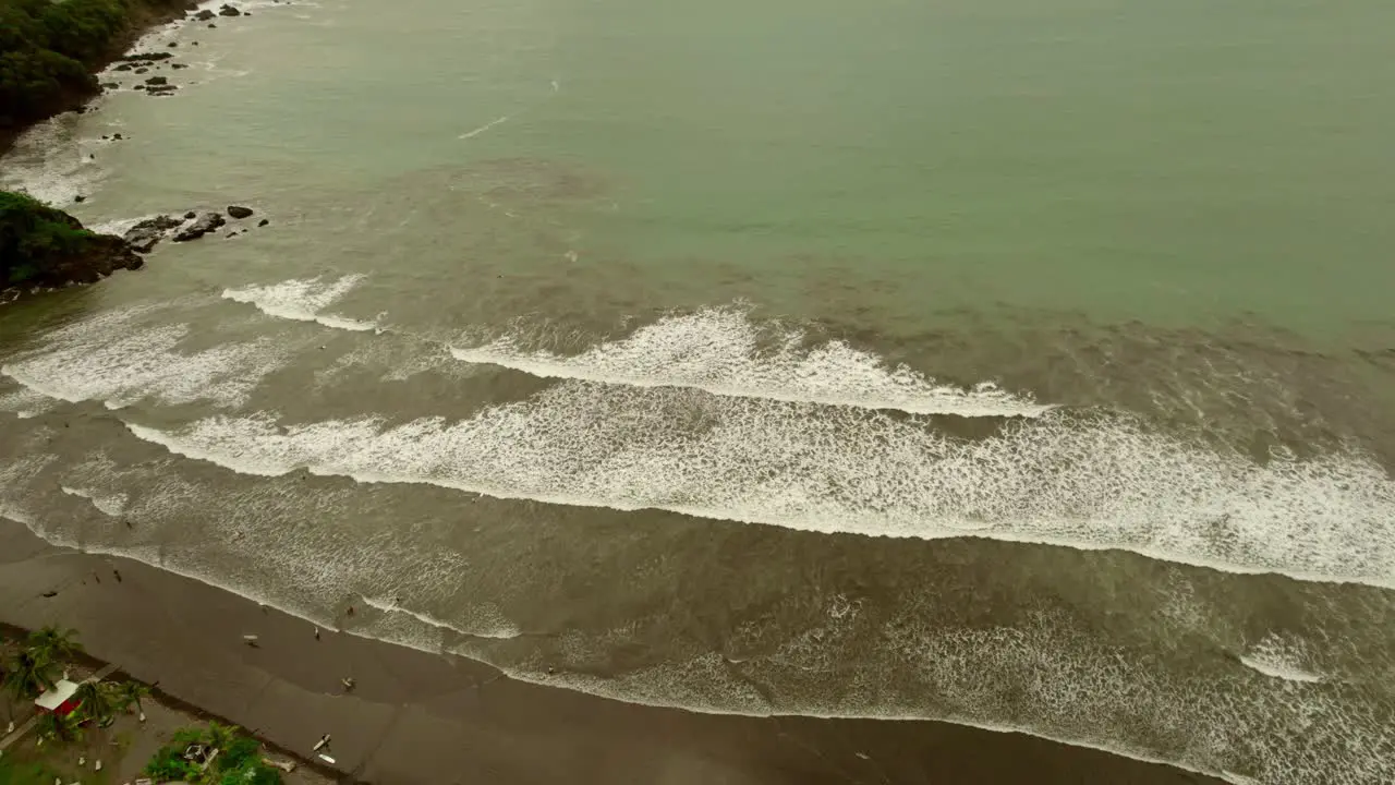 Vast beaches and sea with waves rolling onto shore in Costa Rica