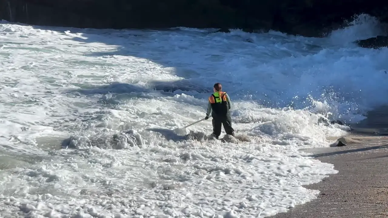 4K footage of workers collecting water sample at La Jolla Cove in San Diego California