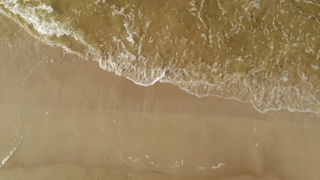 Drone Shot Of Captivating Waves on a Summer Shore