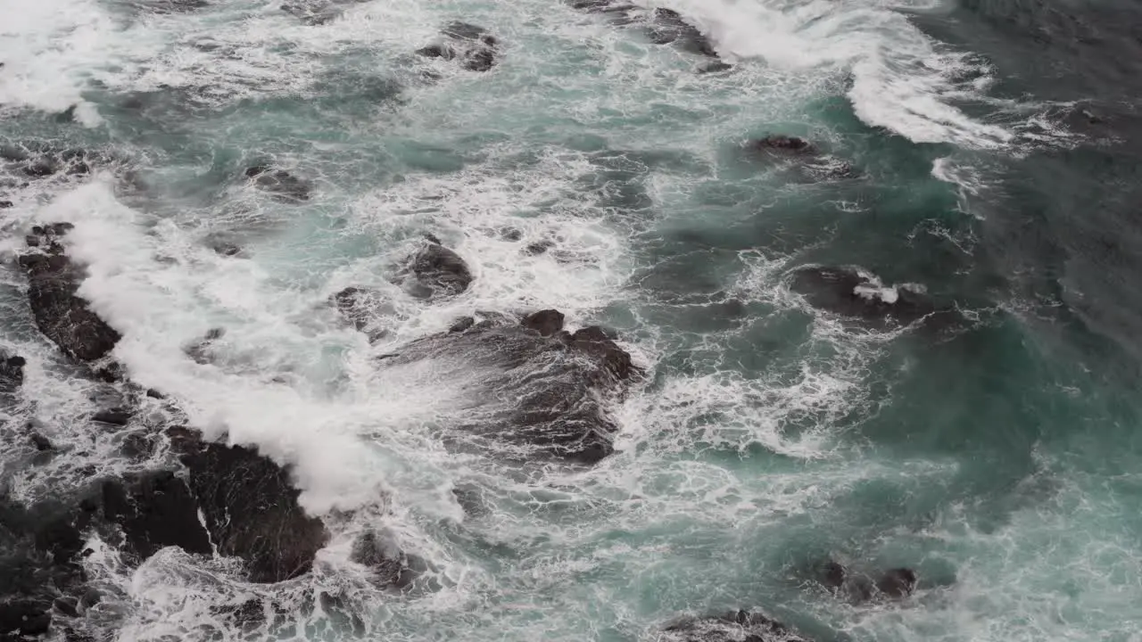 Calming Footage of beautiful blue ocean waves crashing the rocky shore at Loch Ard Gorge 12 Apostles Coast and Hinterland Port Campbell