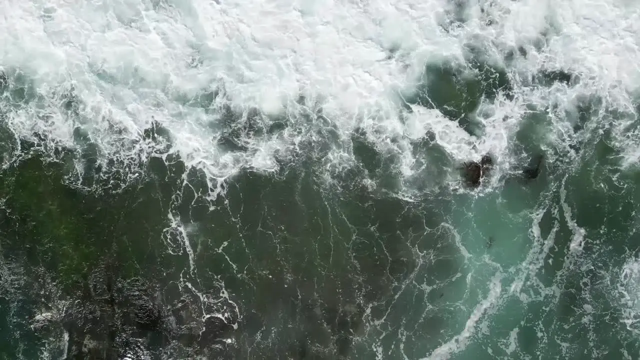 Ocean Waves Crashing Daytime Aerial Bird's Eye View Overhead Shot