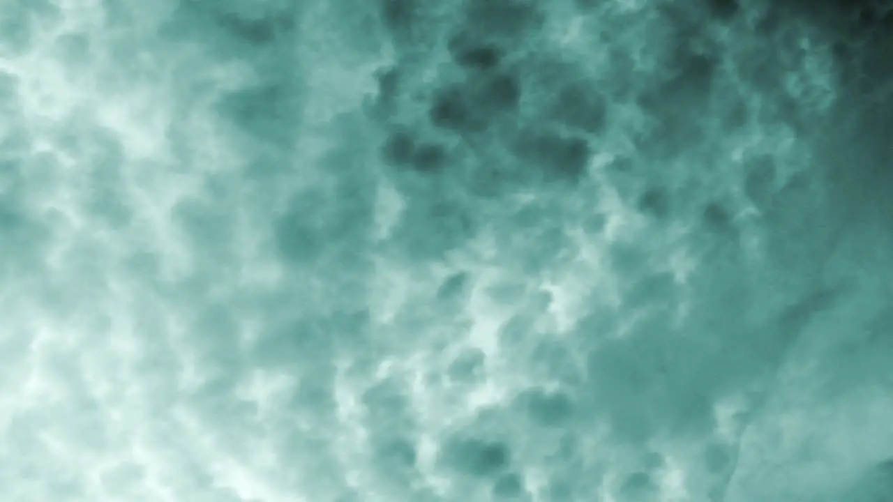 Negative image of clouds moving in time-lapsed motion