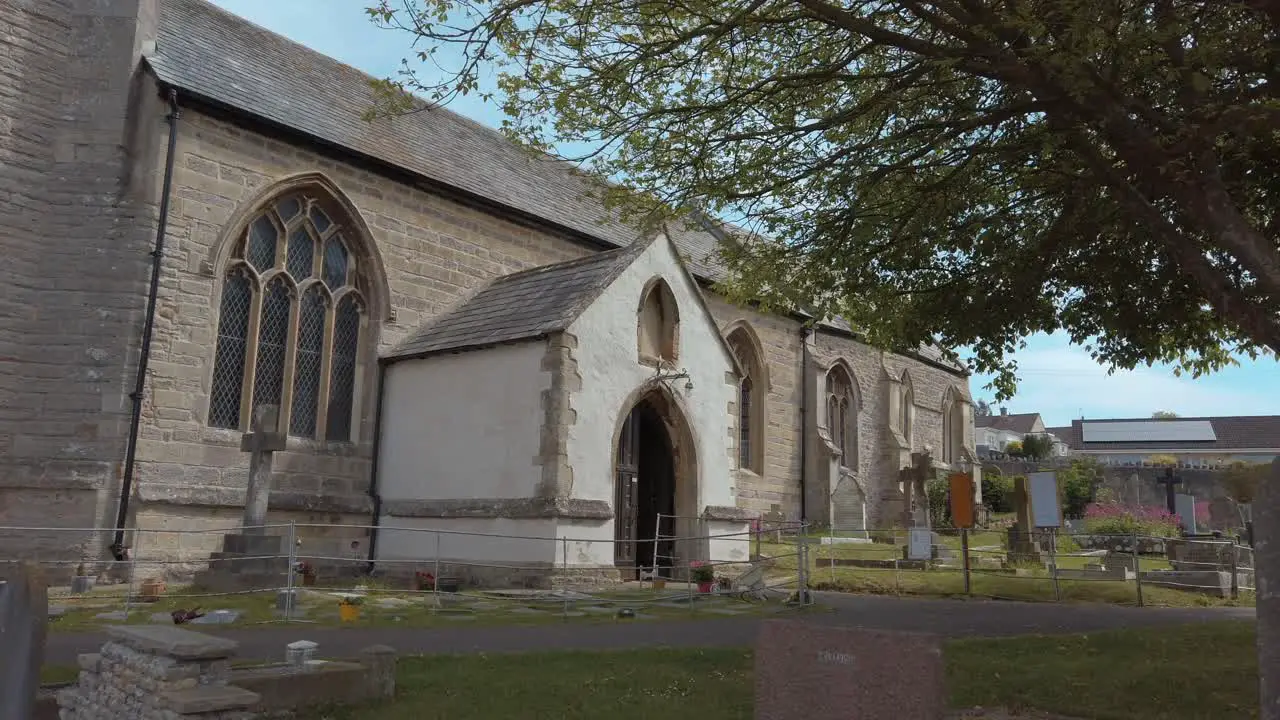 gimbal shot walking through graveyard approaching church