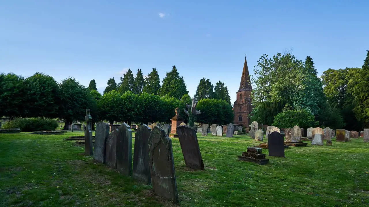 Summer time-lapse from the ancient graveyard of St Nicholas church in the Abbey Fields park of Kenilworth Warwickshire England UK