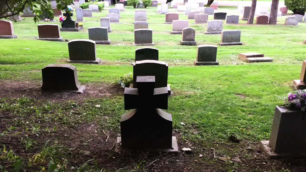 Blank tombstones in rows zoom Prospect Cemetery