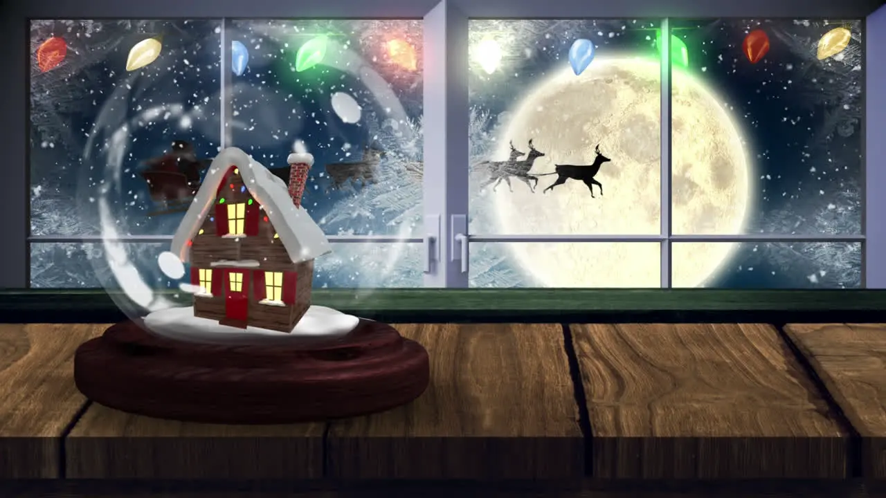 Animation of two snow globe with house with winter scenery and full moon seen through window in the