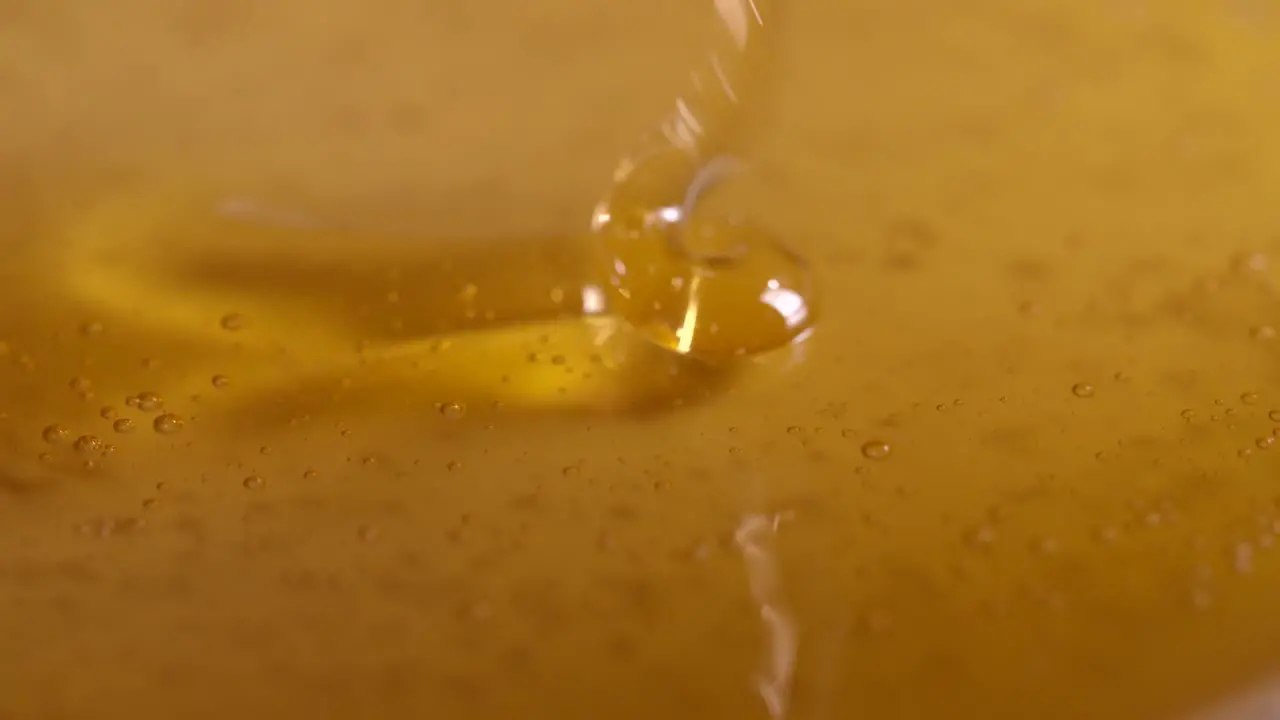 Stirring Honey Close Up