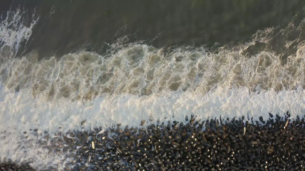 Beach waves on the shore of the Great wall of Lagos