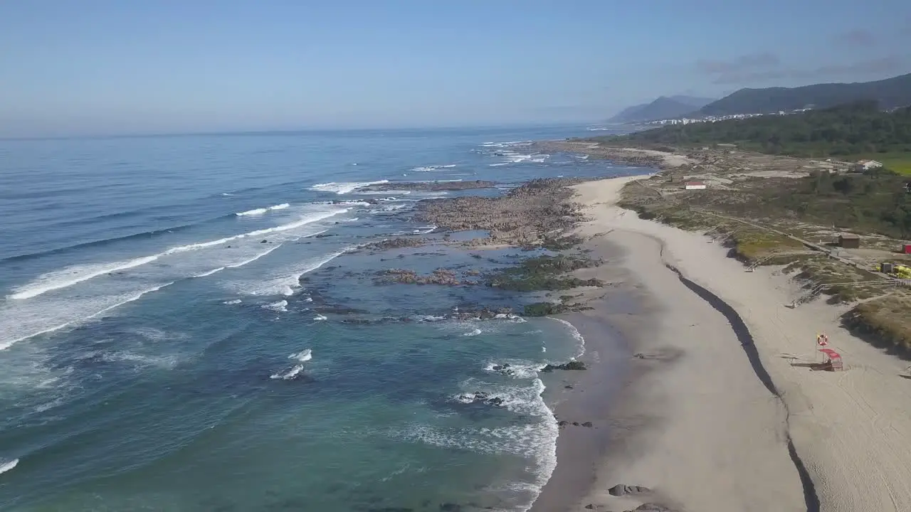 Aerial wide view towards of relaxing Portuguese beach of Afife Viana do Castelo Portugal