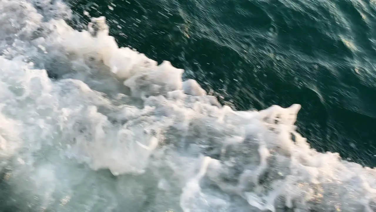 Wake On The Side Of A Speed Boat close up