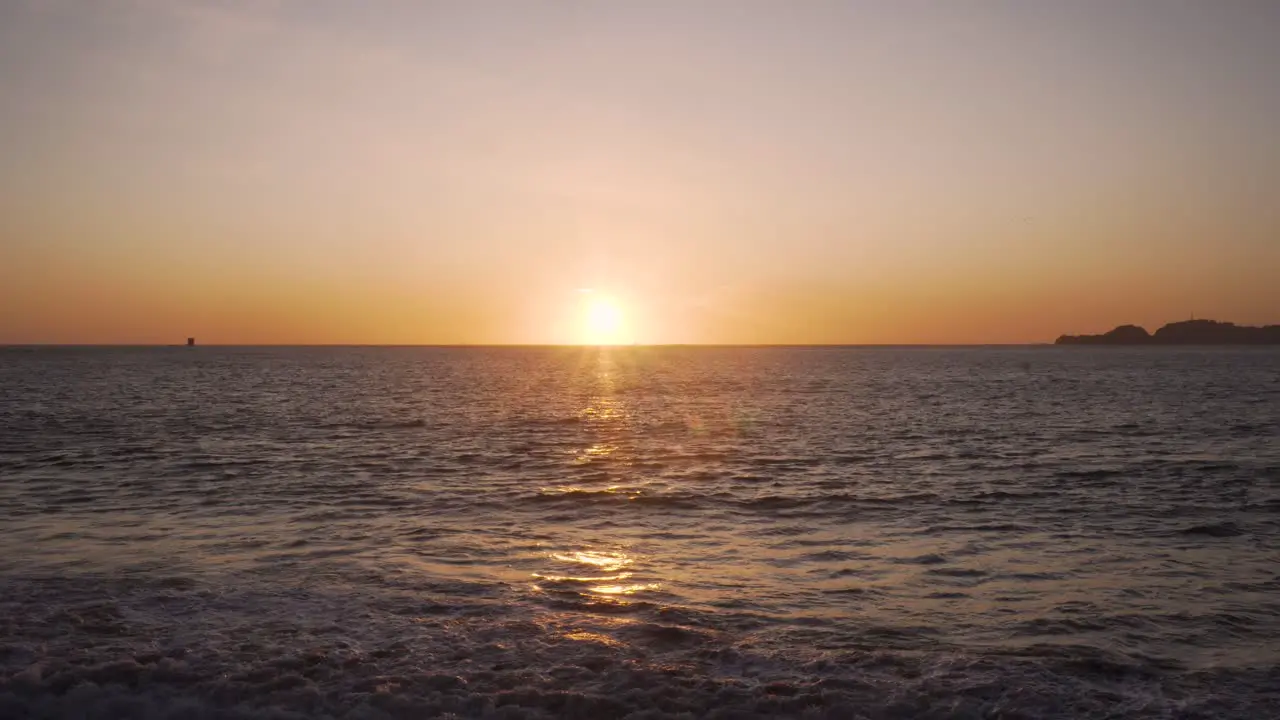 Sunset Sun on Pacific Ocean Horizon in Front of San Francisco Bay Baker Beach