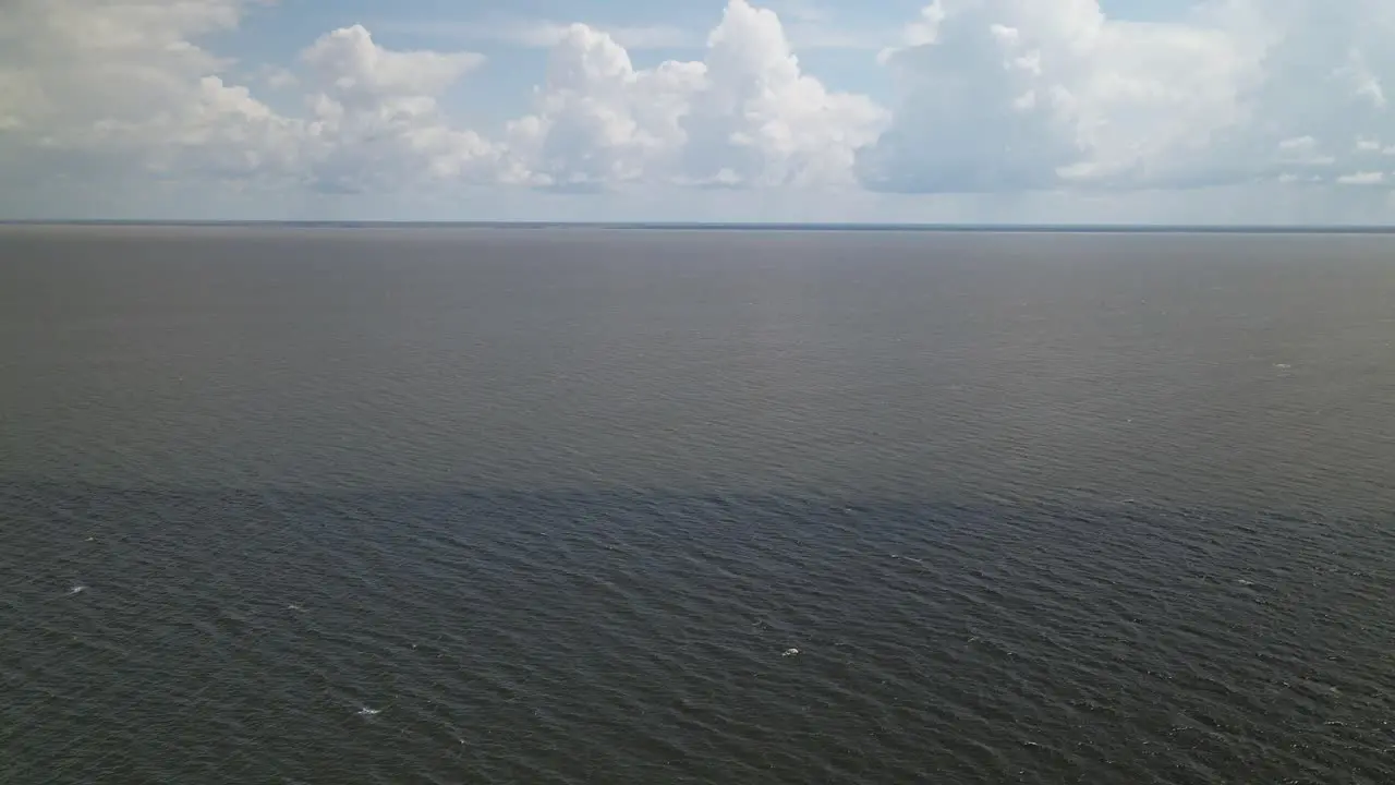 Two tides meeting in the Atlantic ocean between the the Caribbean island of Trinidad and Venezuela