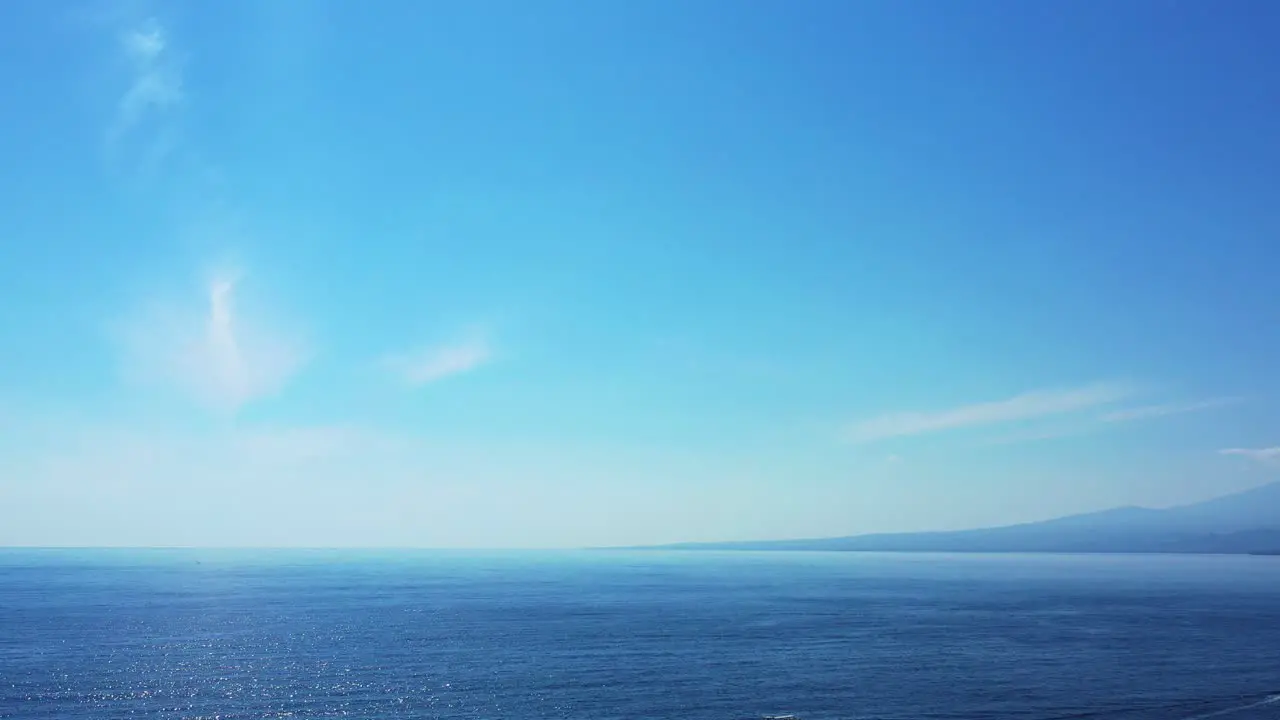 Beautiful calm blue waters of the vast expanse of the Pacific Ocean ripples glistening from the sun