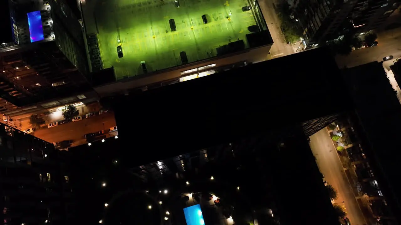 Aerial view tilting over condos in West loop revealing the downtown of Chicago