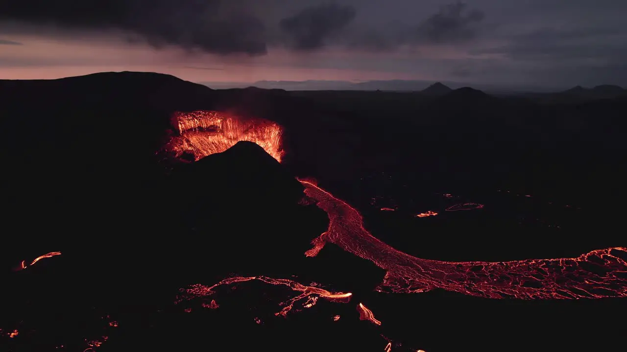 Active volcano emitting smoke and lava