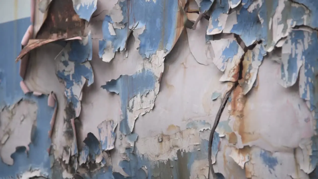 Close-up of a rusty blue paint on metal