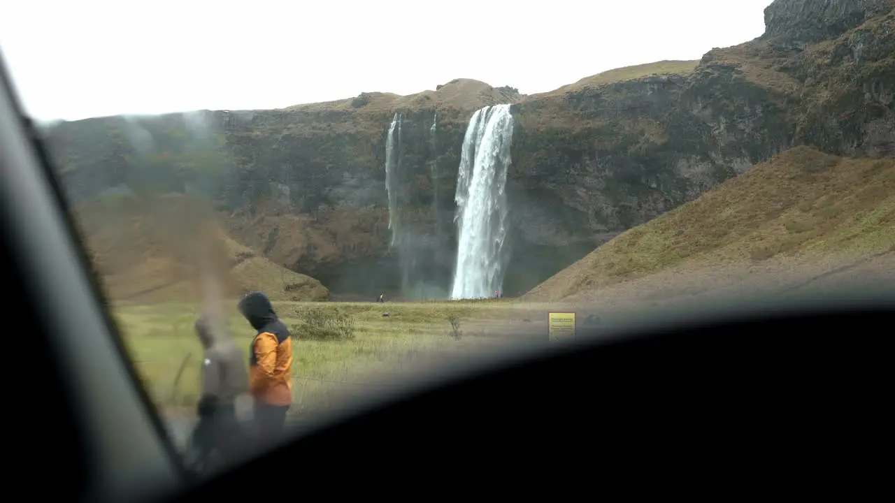 Scenery of waterfall in highlands on rainy day