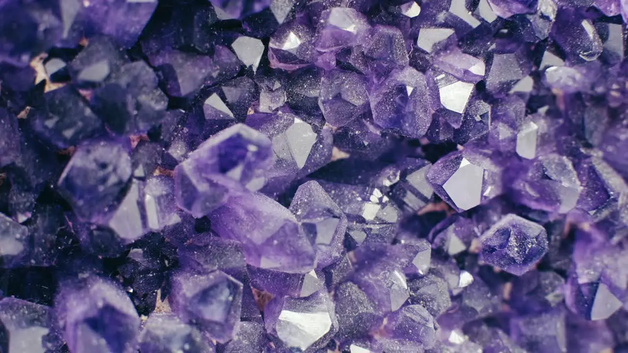 Footage of amazing flashing Violet Crystal cluster close up