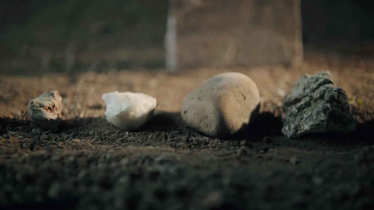 Smooth close-up macro dolly shot of different kinds of rocks and materials