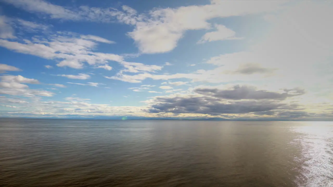 Hyperlapse Flying Over the Ocean Through the Clouds