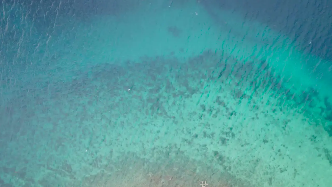 Tio Down Aerial View of Turquoise Caribbean Sea Water at Coast of Saint Thomas US Virgin Island High Angle Drone Shot