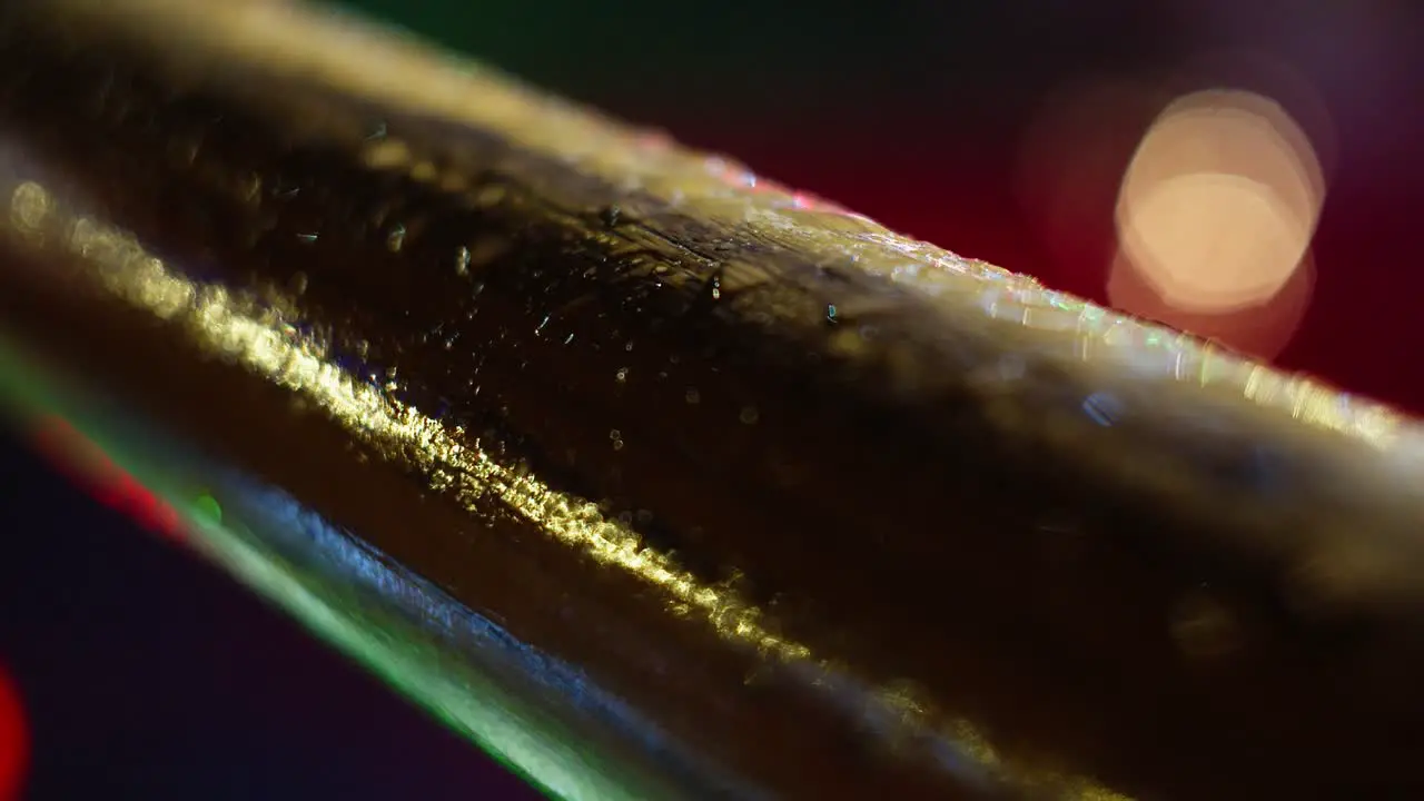 Close-up mist forming on a piece of wood creating a nice reflection