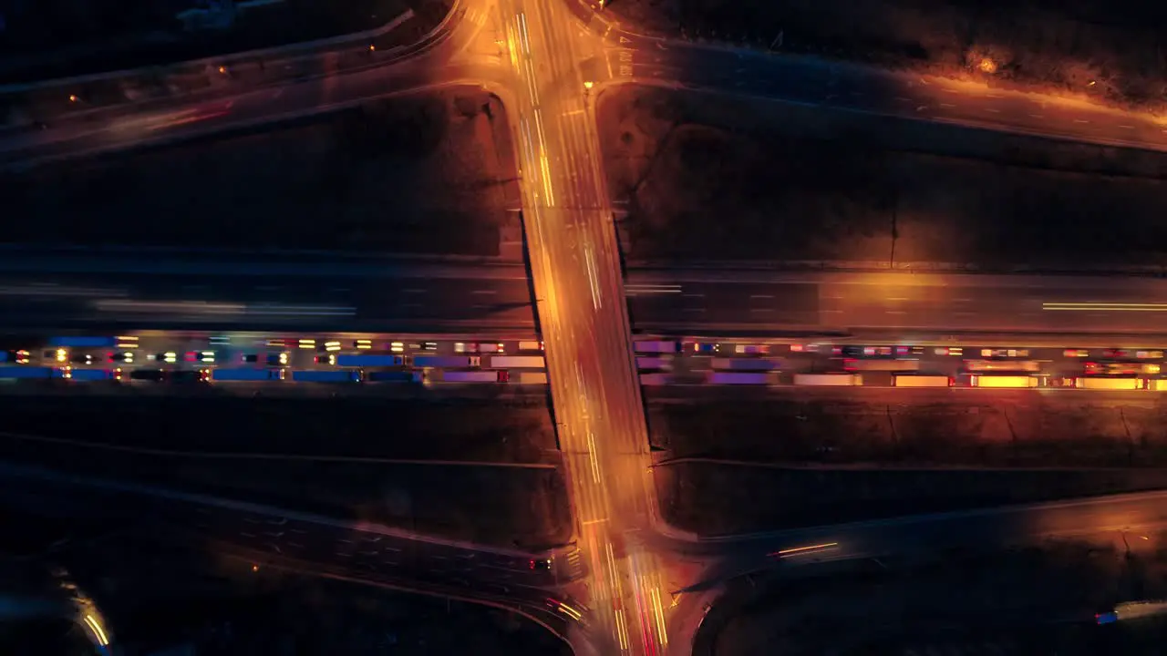 Night Long-exposure timelapse of a busy highway with a bridge crossing over